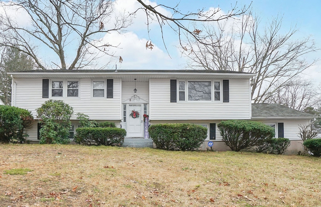 290 Newton Road Springfield, MA 01118 - Photo 2 of 38 a front view of a house with garden