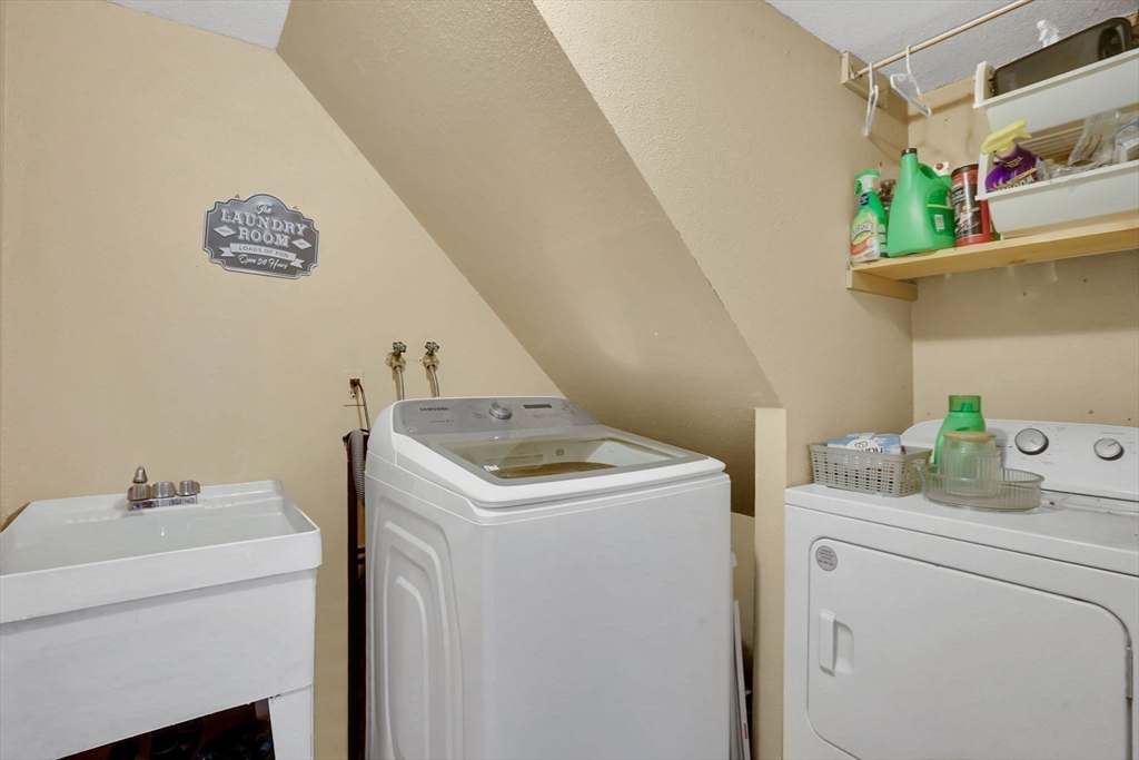 290 Newton Road Springfield, MA 01118 - Photo 30 of 38 a utility room with dryer and washer