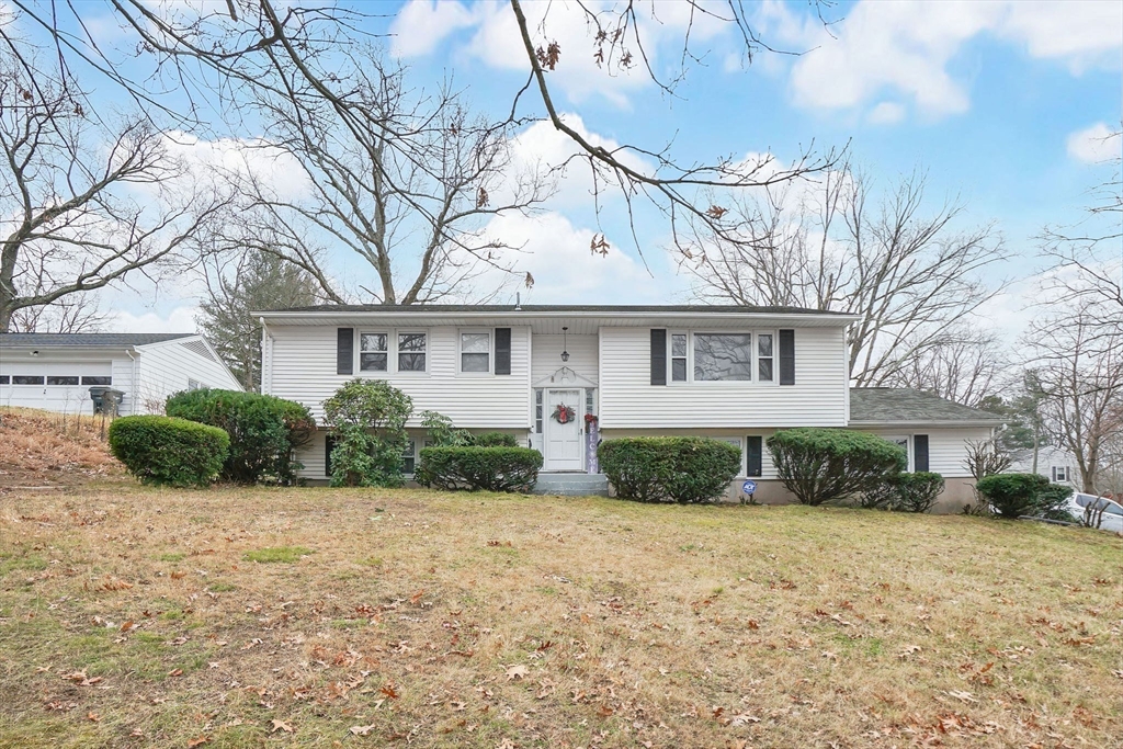 290 Newton Road Springfield, MA 01118 - Photo 34 of 38 a front view of a house with a yard