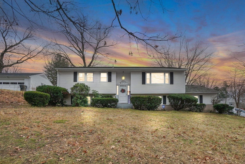 290 Newton Road Springfield, MA 01118 - Photo 35 of 38 a front view of a house with a yard