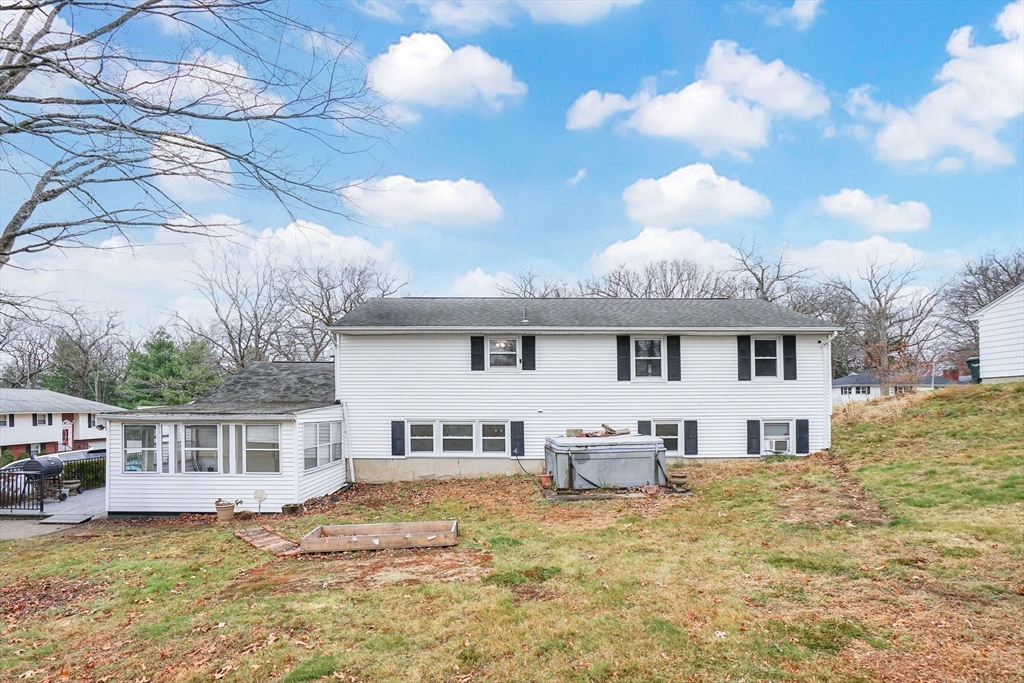 290 Newton Road Springfield, MA 01118 - Photo 38 of 38 a front view of a house with a yard covered with snow