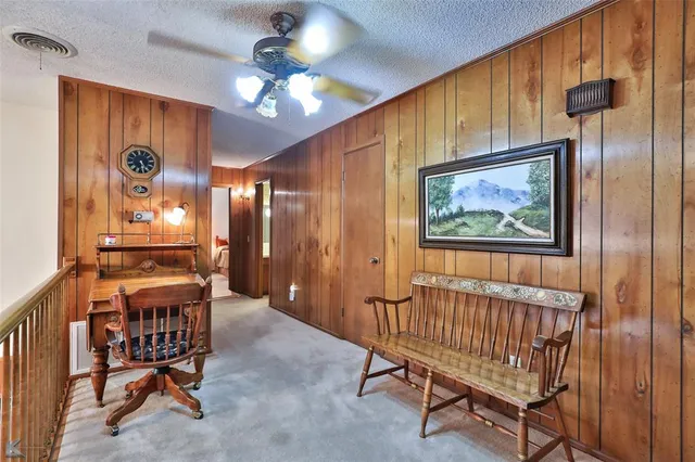 a bedroom with bed and window