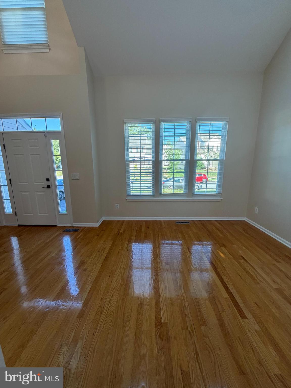 13952 Bishops Bequest Road Upper Marlboro, MD 20772 - Photo 7 of 28 a view of empty room with wooden floor