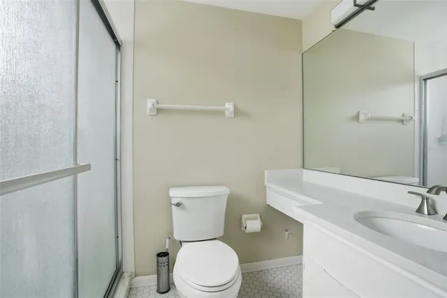 a view of house with swimming pool outdoor seating