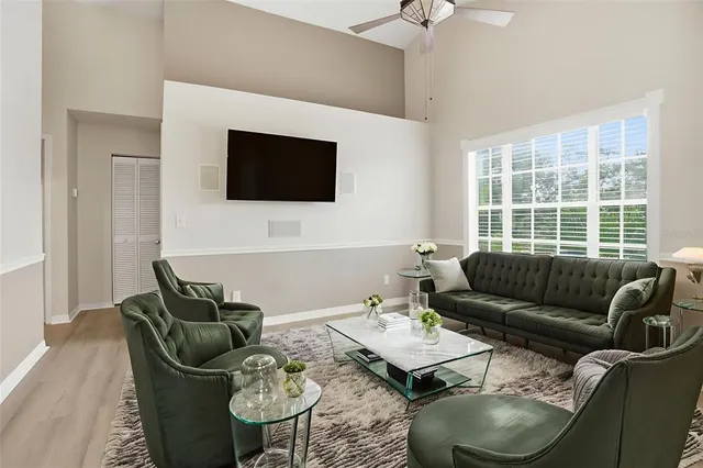 a view of kitchen with microwave and cabinets