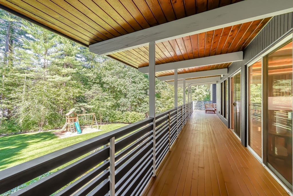 53 Beaver Road Weston, MA 02493 - Photo 13 of 42 a view of balcony with wooden floor