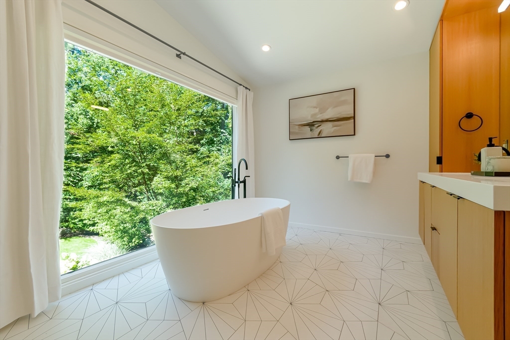 53 Beaver Road Weston, MA 02493 - Photo 19 of 42 a living room with a large window