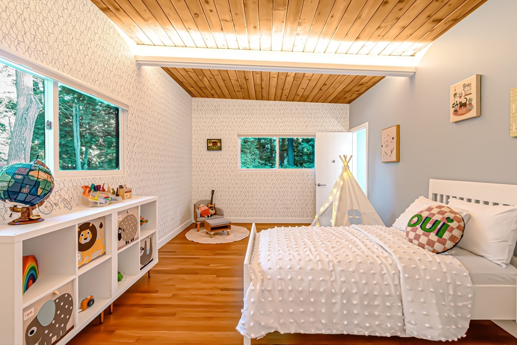 53 Beaver Road Weston, MA 02493 - Photo 22 of 42 a bed room with a bed and a window