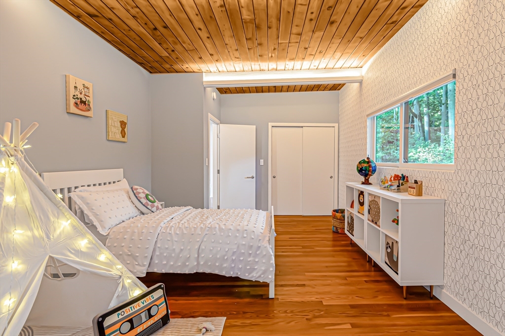 53 Beaver Road Weston, MA 02493 - Photo 23 of 42 a bedroom with bed and a window