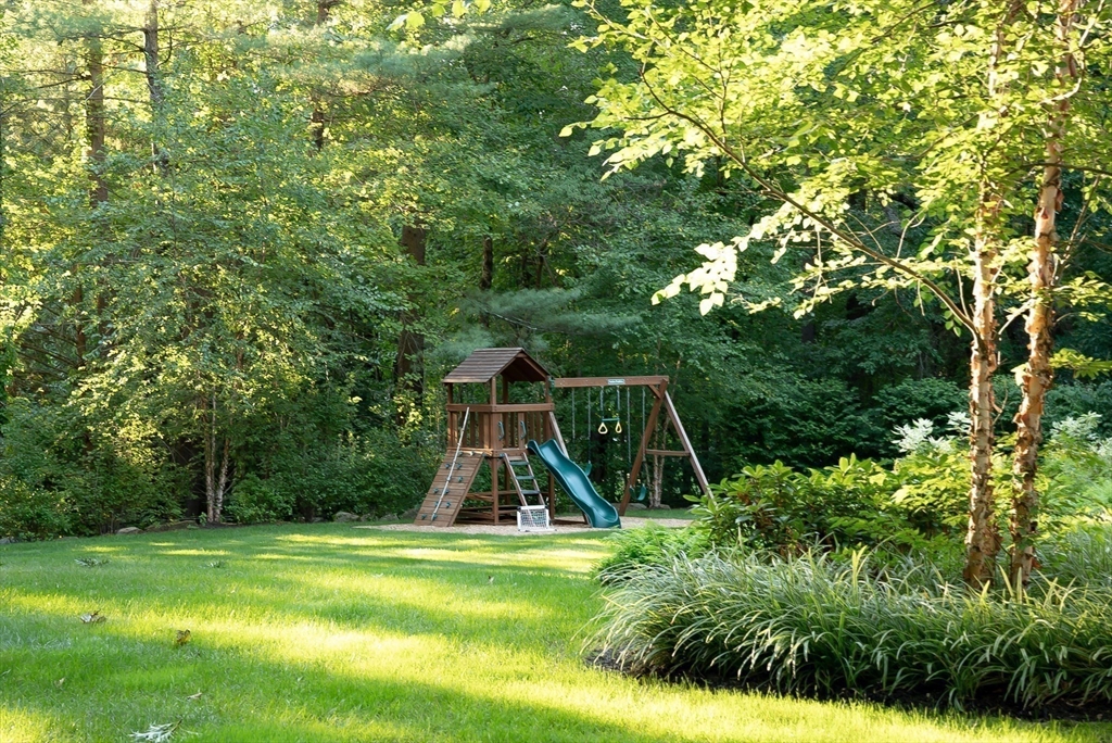 53 Beaver Road Weston, MA 02493 - Photo 41 of 42 a view of a chair and table in the garden