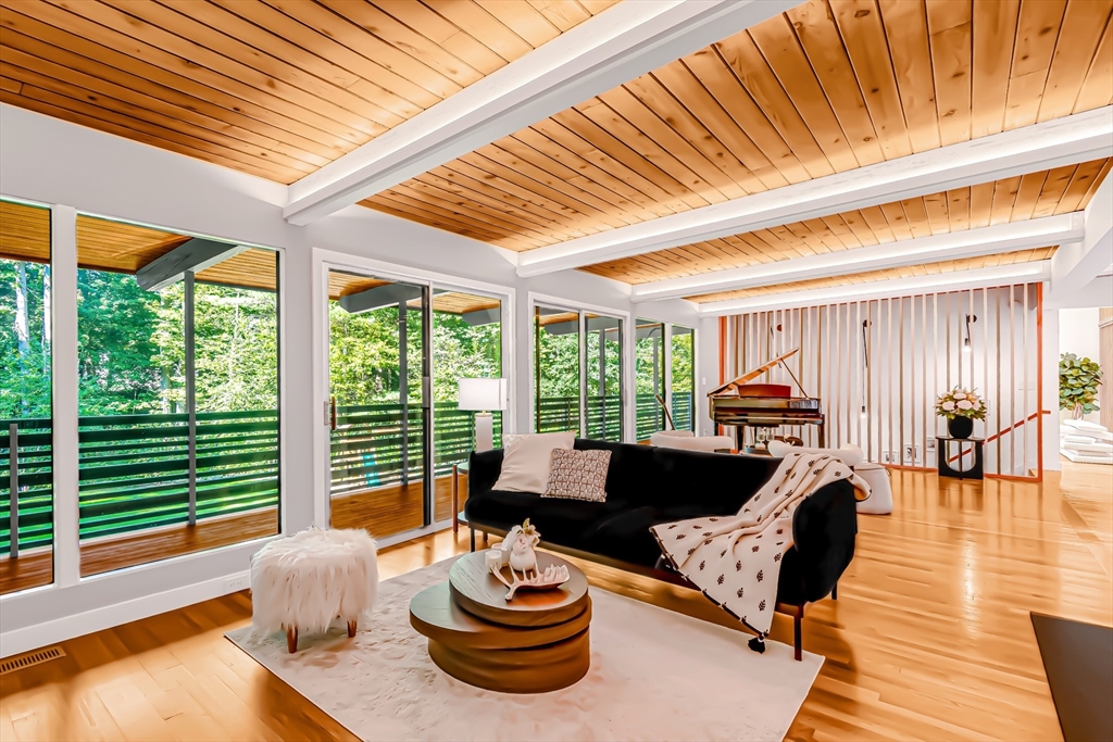 53 Beaver Road Weston, MA 02493 - Photo 6 of 42 a living room with furniture and a large window