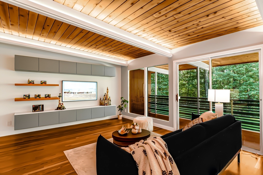 53 Beaver Road Weston, MA 02493 - Photo 7 of 42 a room with furniture and large windows