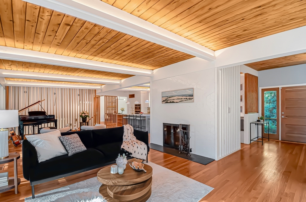 53 Beaver Road Weston, MA 02493 - Photo 8 of 42 a living room with furniture and wooden floor