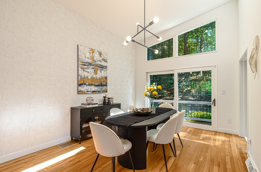53 Beaver Road Weston, MA 02493 - Photo 10 of 42 a view of a dining room with furniture window and outside view