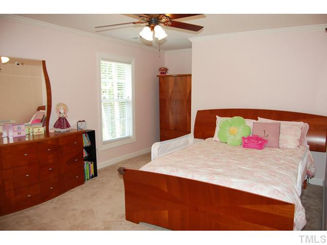 9219 Stone Mountain Road Raleigh, NC 27613 - Photo 17 of 25 Just down the hall from the master are two secondary bedrooms; each are very spacious with lots of closet space and share a Jack-n-Jill bath. Bedroom