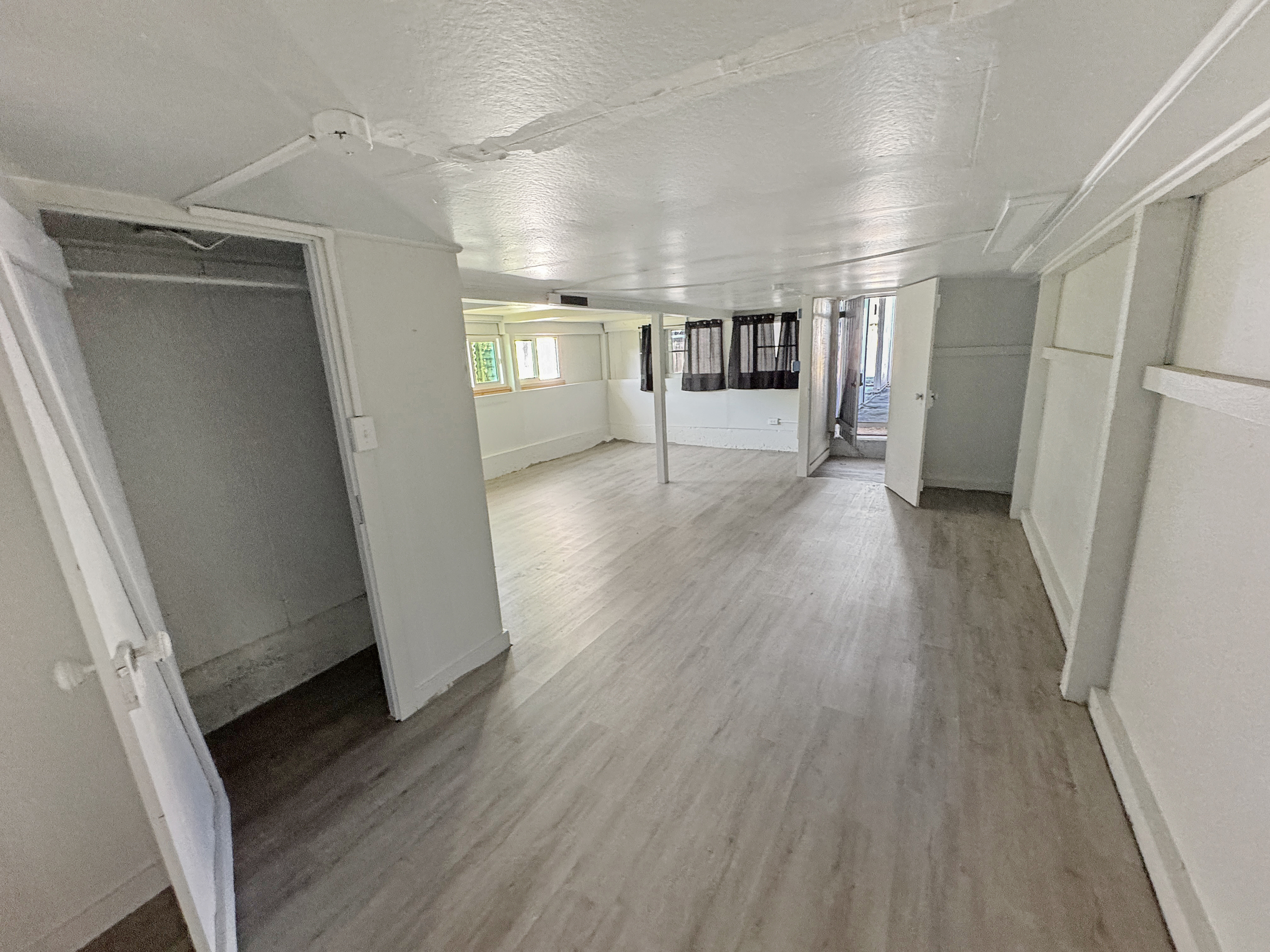 136 Mauna Loa Street Hilo, HI 96720 - Photo 14 of 23 a view of entryway with stairs and wooden floor