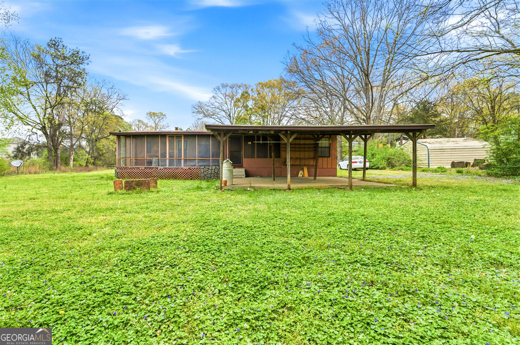 85 Honeysuckle Drive Southwest Cartersville, GA 30120 - Photo 20 of 20 a backyard of a house with lots of green space