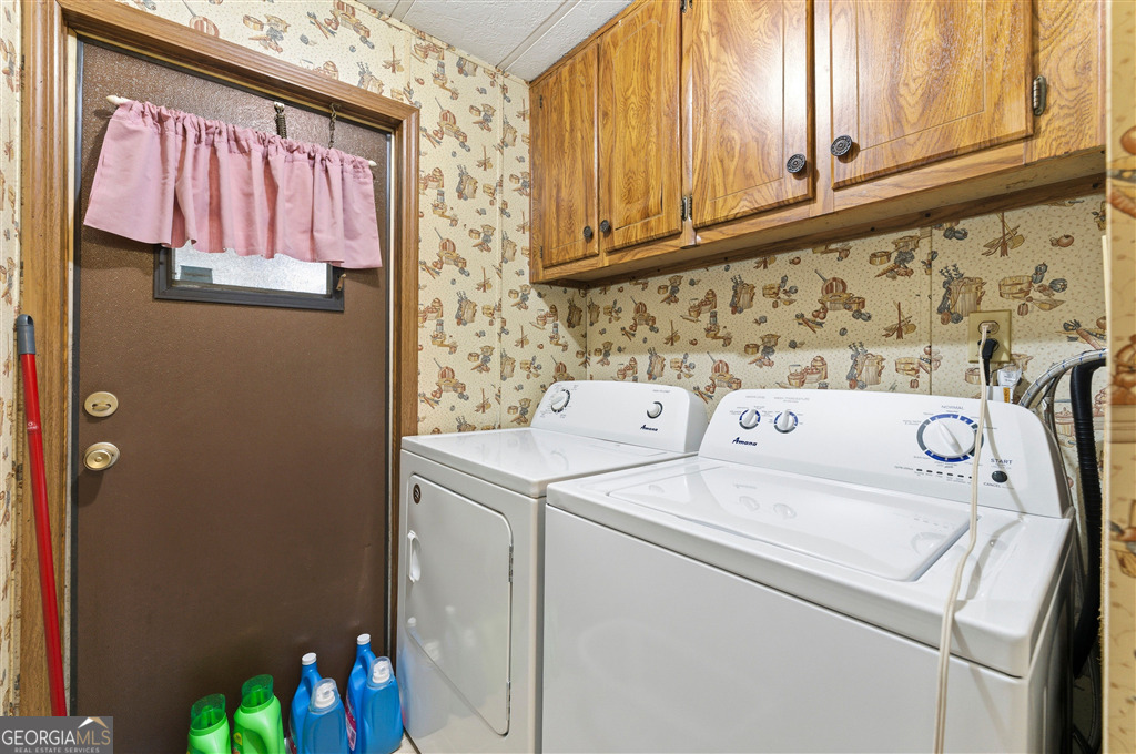 85 Honeysuckle Drive Southwest Cartersville, GA 30120 - Photo 10 of 20 a utility room with dryer and washer