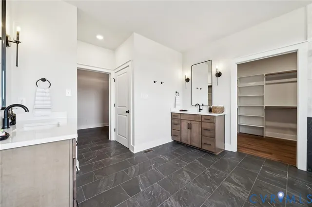 a bed room with furniture and a large window