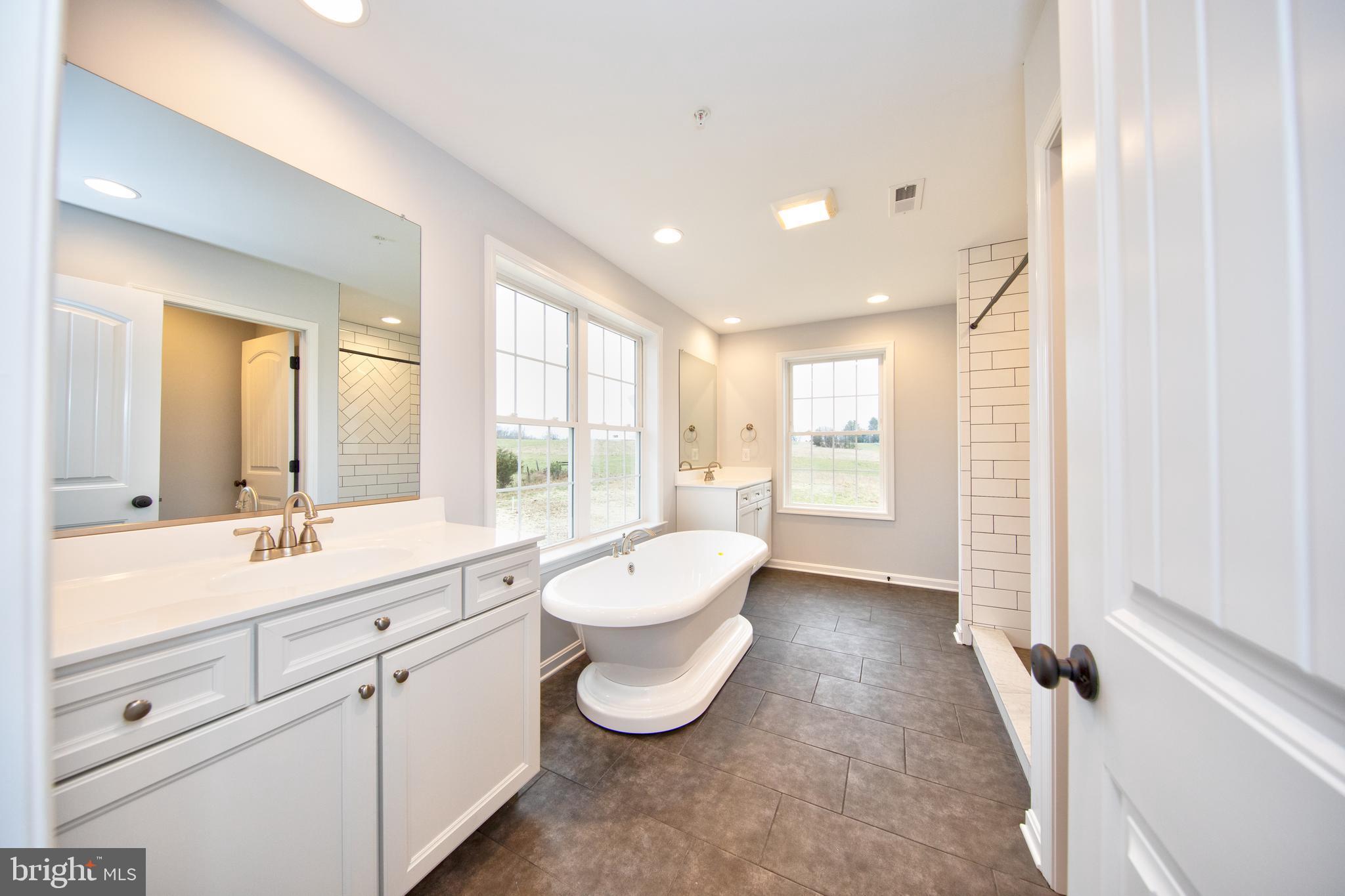 4111 Houcks Road Monkton, MD 21111 - Photo 23 of 35 Owners bath w/ soaking tub & sep vanities