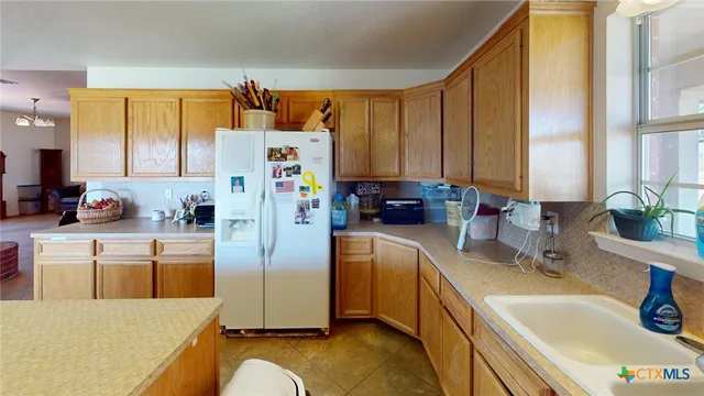 a bathroom with a sink and toilet