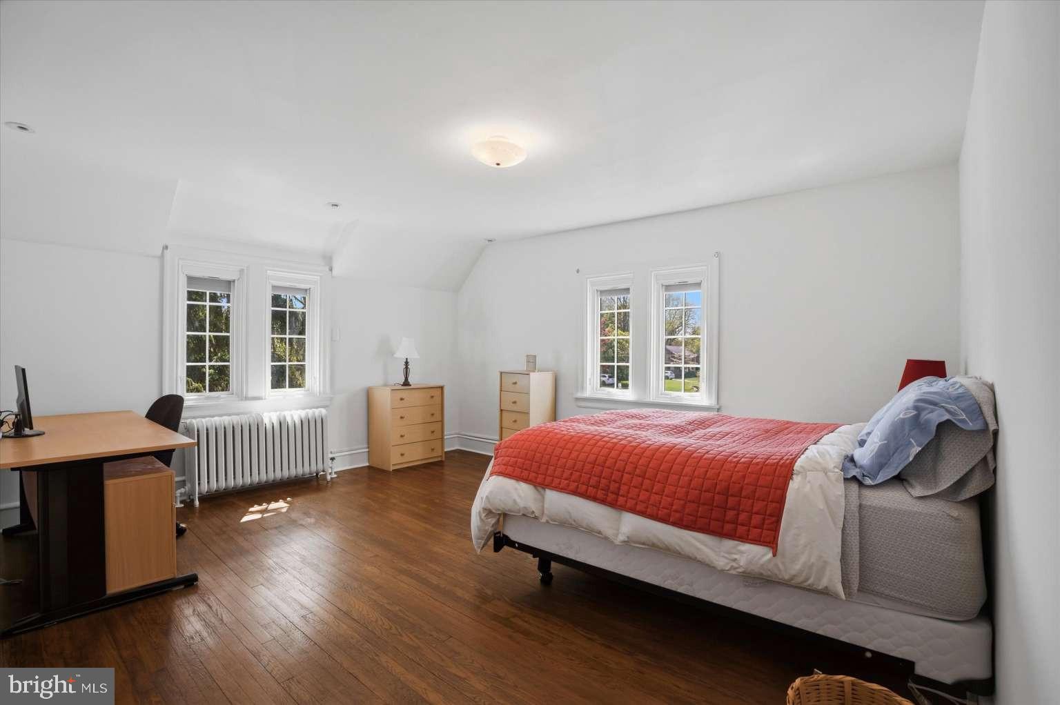 273 Strafford Avenue Wayne, PA 19087 - Photo 22 of 42 a bedroom with a bed and a couch