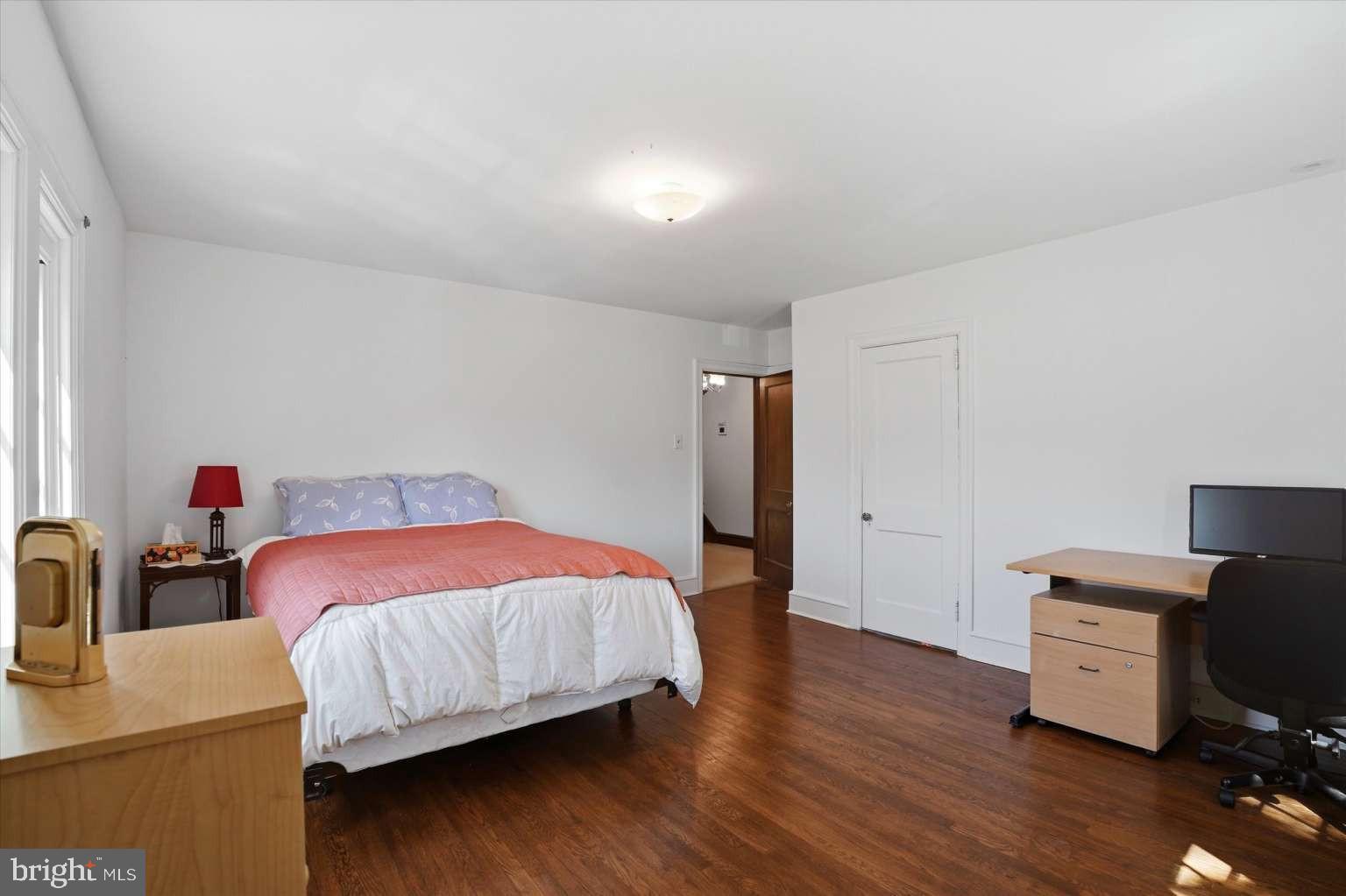 273 Strafford Avenue Wayne, PA 19087 - Photo 23 of 42 a bedroom with a bed and a desk