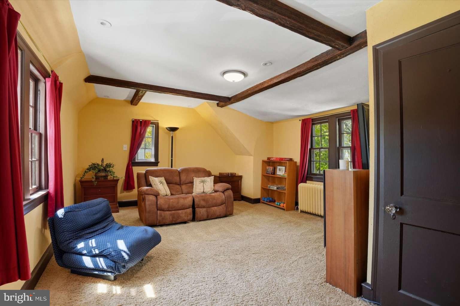 273 Strafford Avenue Wayne, PA 19087 - Photo 27 of 42 a living room with furniture and a large window