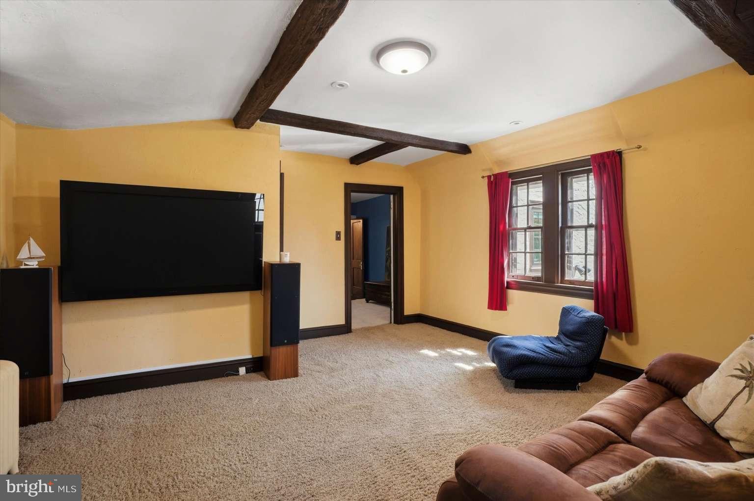 273 Strafford Avenue Wayne, PA 19087 - Photo 28 of 42 a living room with furniture and a flat screen tv