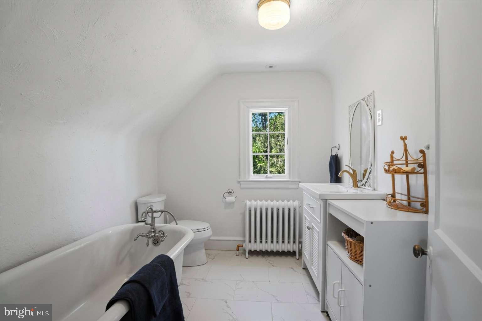 273 Strafford Avenue Wayne, PA 19087 - Photo 32 of 42 a bathroom with a sink and a bathtub