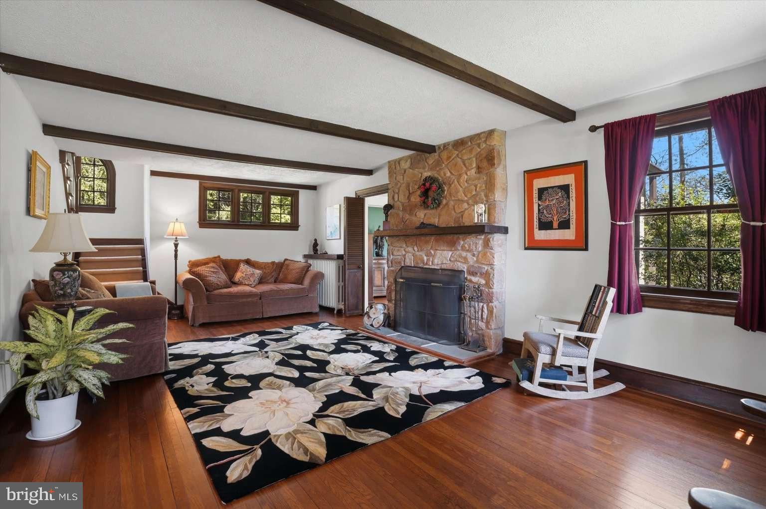 273 Strafford Avenue Wayne, PA 19087 - Photo 6 of 42 a bedroom with furniture and a fireplace