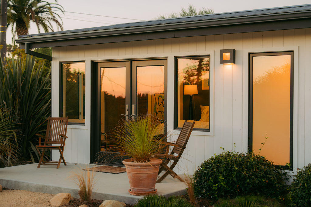 415 Yankee Farm Road Santa Barbara, CA 93109 - Photo 16 of 25 a front view of a house with outdoor seating and plants