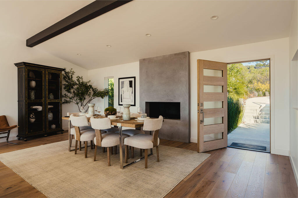 415 Yankee Farm Road Santa Barbara, CA 93109 - Photo 6 of 25 a dining room with furniture and wooden floor