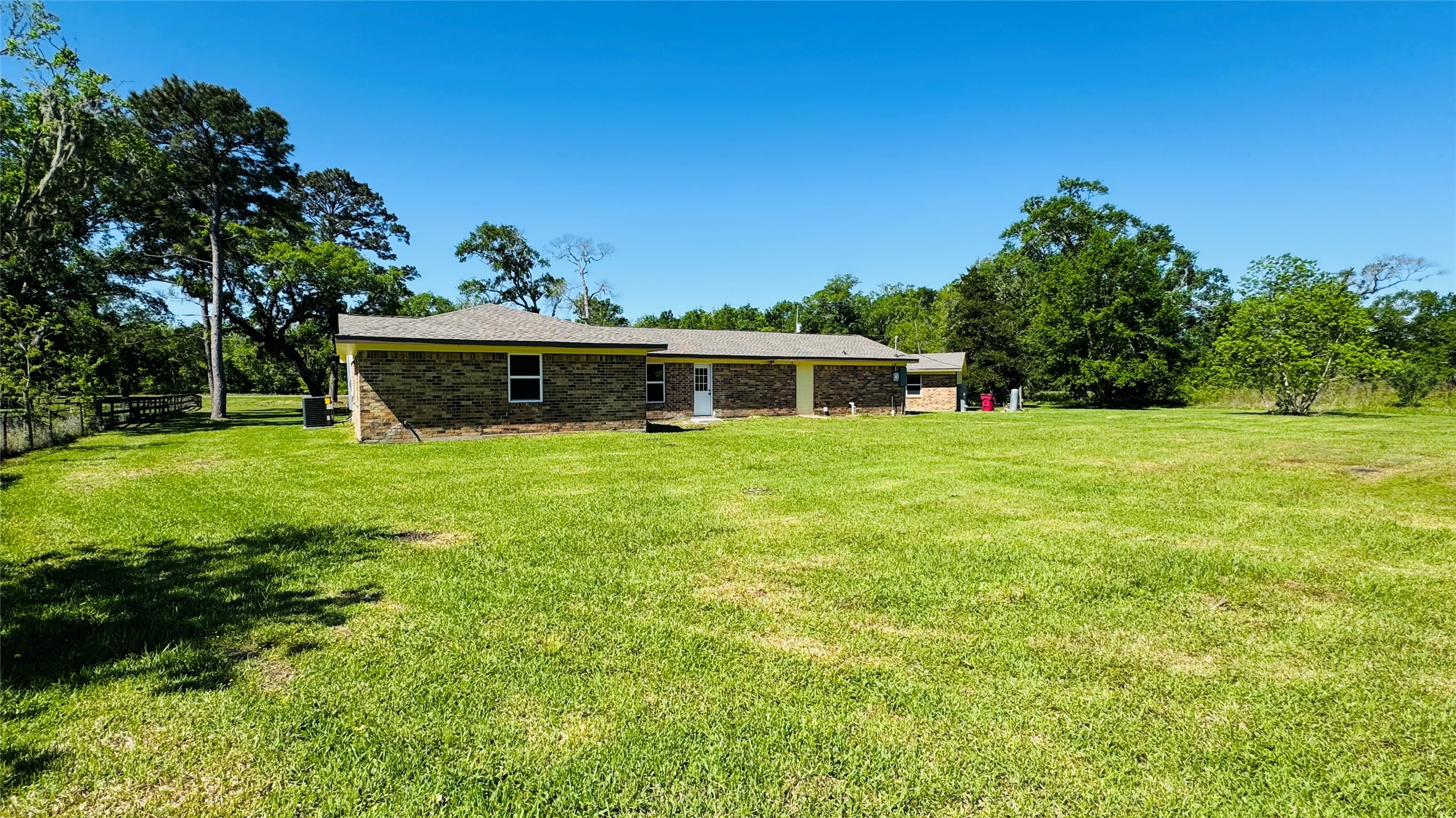 1434 County Road 878A Sweeny, TX 77480 - Photo 5 of 36 a view of a house with a yard