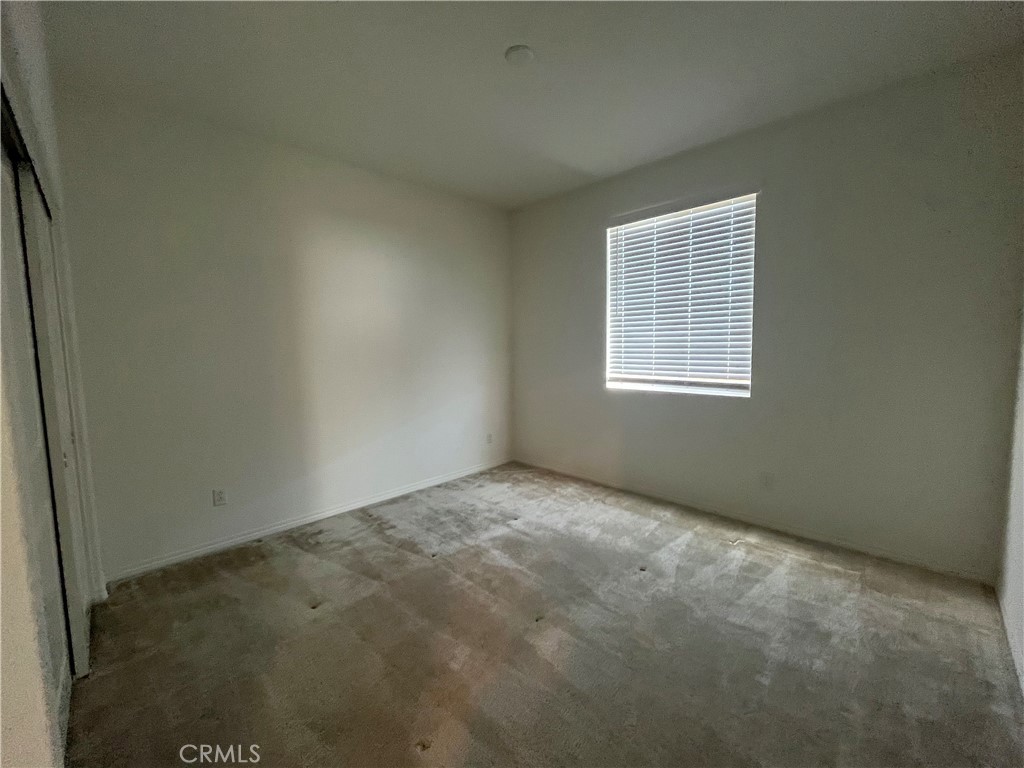 5233 Saloon Street Hemet, CA 92545 - Photo 14 of 18 an empty room with a window