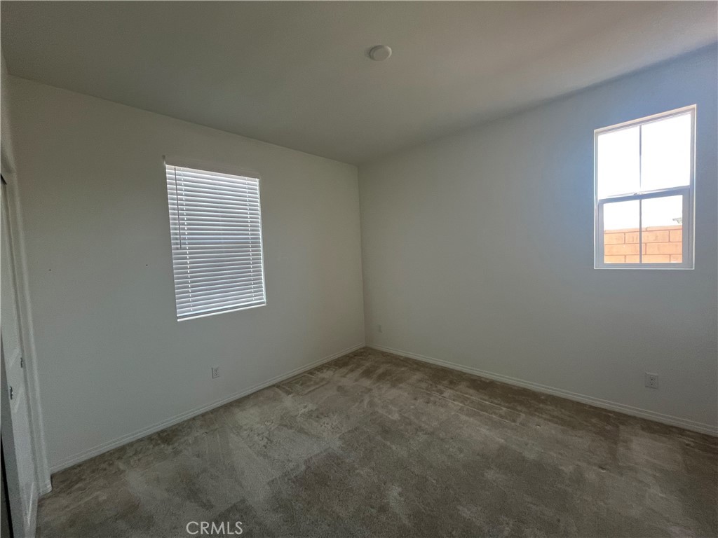 5233 Saloon Street Hemet, CA 92545 - Photo 15 of 18 an empty room with a window