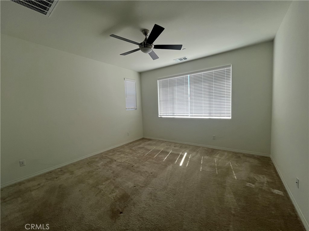 5233 Saloon Street Hemet, CA 92545 - Photo 6 of 18 a view of an empty room with a window