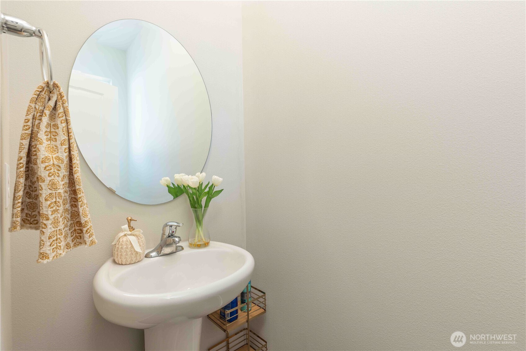 1164 Southwest Pendleton Way Port Orchard, WA 98367 - Photo 11 of 32 a bathroom with a sink and a mirror