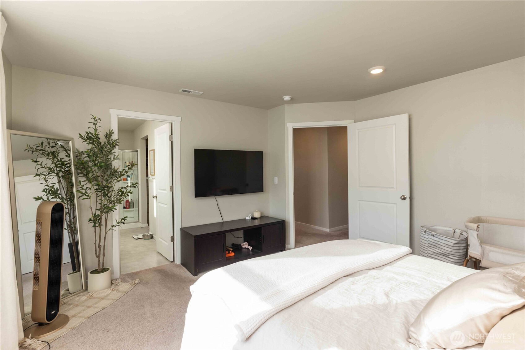 1164 Southwest Pendleton Way Port Orchard, WA 98367 - Photo 13 of 32 a bedroom with a bed and a flat screen tv