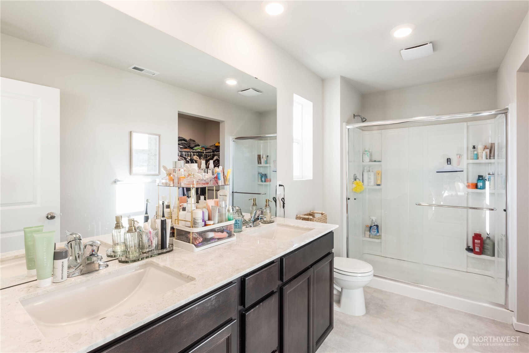 1164 Southwest Pendleton Way Port Orchard, WA 98367 - Photo 14 of 32 a bathroom with a sink a toilet and shower