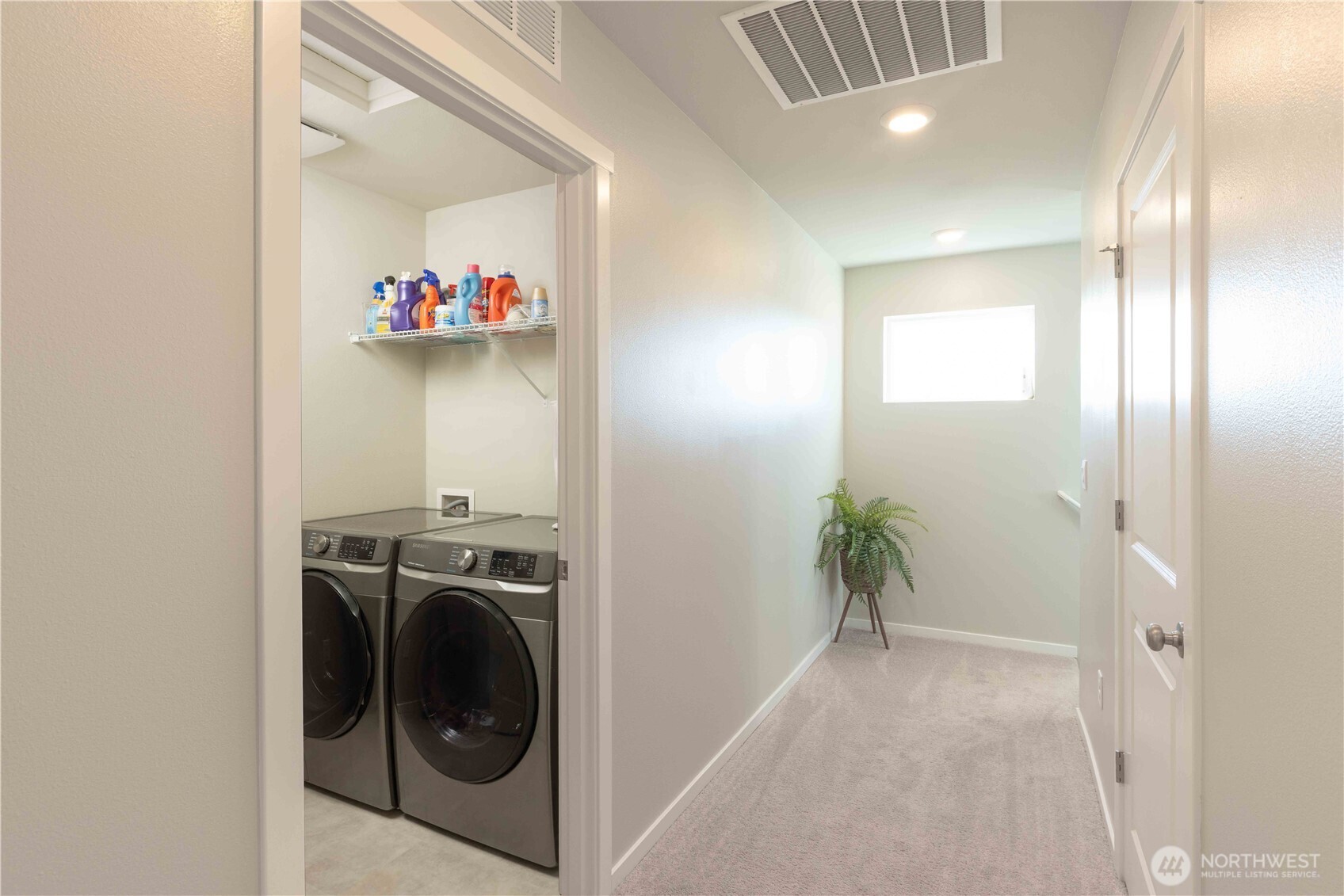 1164 Southwest Pendleton Way Port Orchard, WA 98367 - Photo 19 of 32 a view of a storage and utility room with washer and dryer