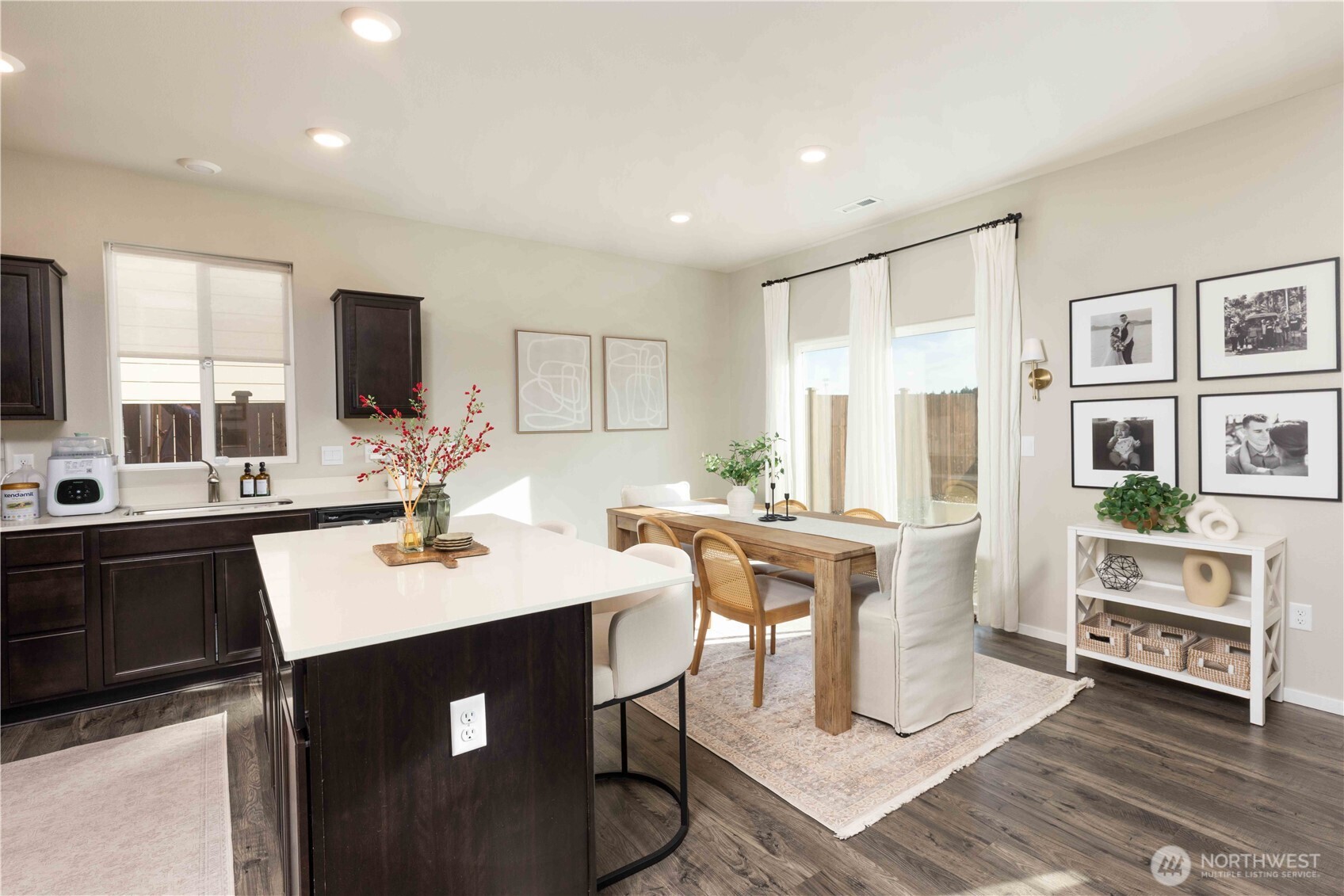 1164 Southwest Pendleton Way Port Orchard, WA 98367 - Photo 8 of 32 a kitchen with a sink cabinets and wooden floor