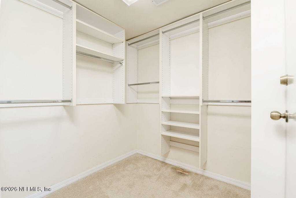 8 Peruvian Lane Ormond Beach, FL 32174 - Photo 14 of 40 a view of an empty walk in closet