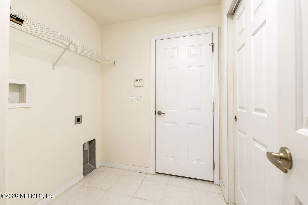 8 Peruvian Lane Ormond Beach, FL 32174 - Photo 17 of 40 a view of a room with a wardrobe