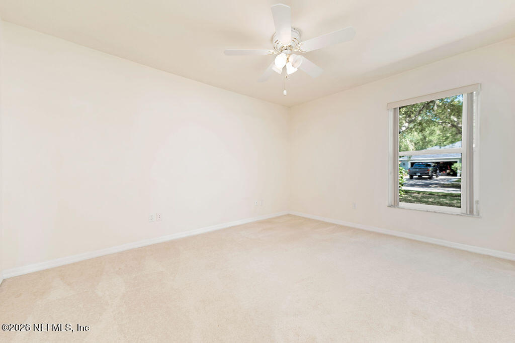8 Peruvian Lane Ormond Beach, FL 32174 - Photo 21 of 40 an empty room with a window