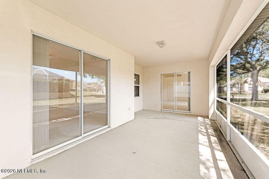 8 Peruvian Lane Ormond Beach, FL 32174 - Photo 25 of 40 a view of an empty room and a window