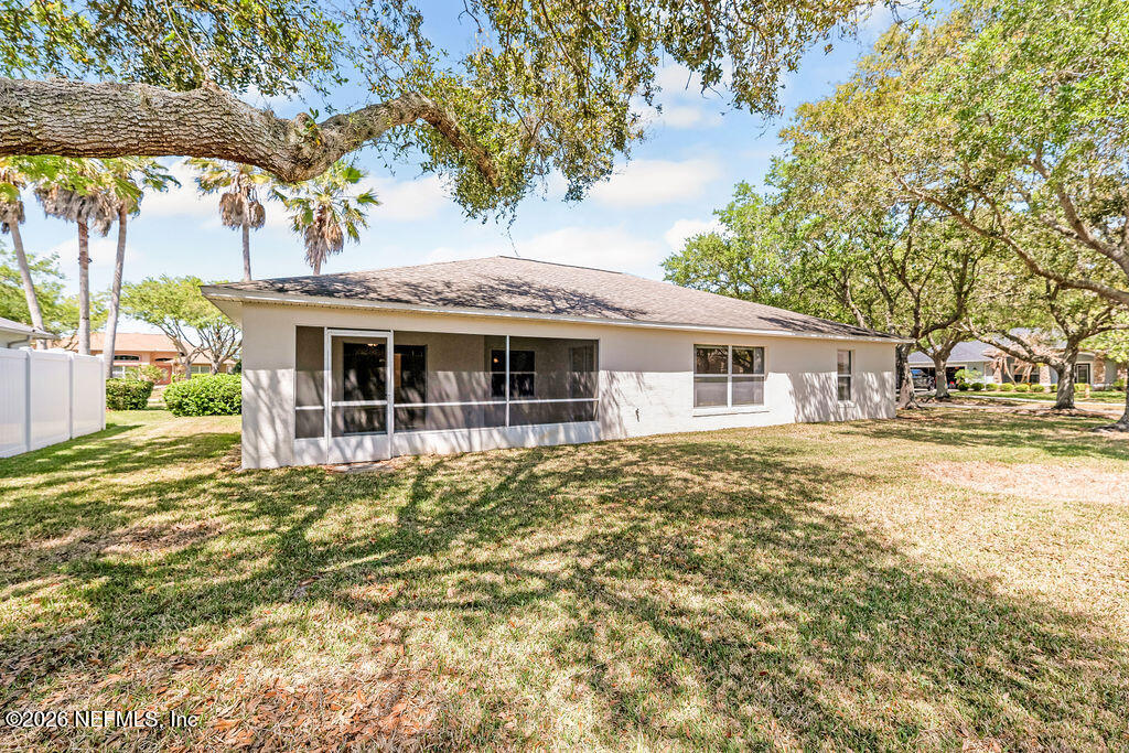 8 Peruvian Lane Ormond Beach, FL 32174 - Photo 26 of 40 a front view of a house with a garden