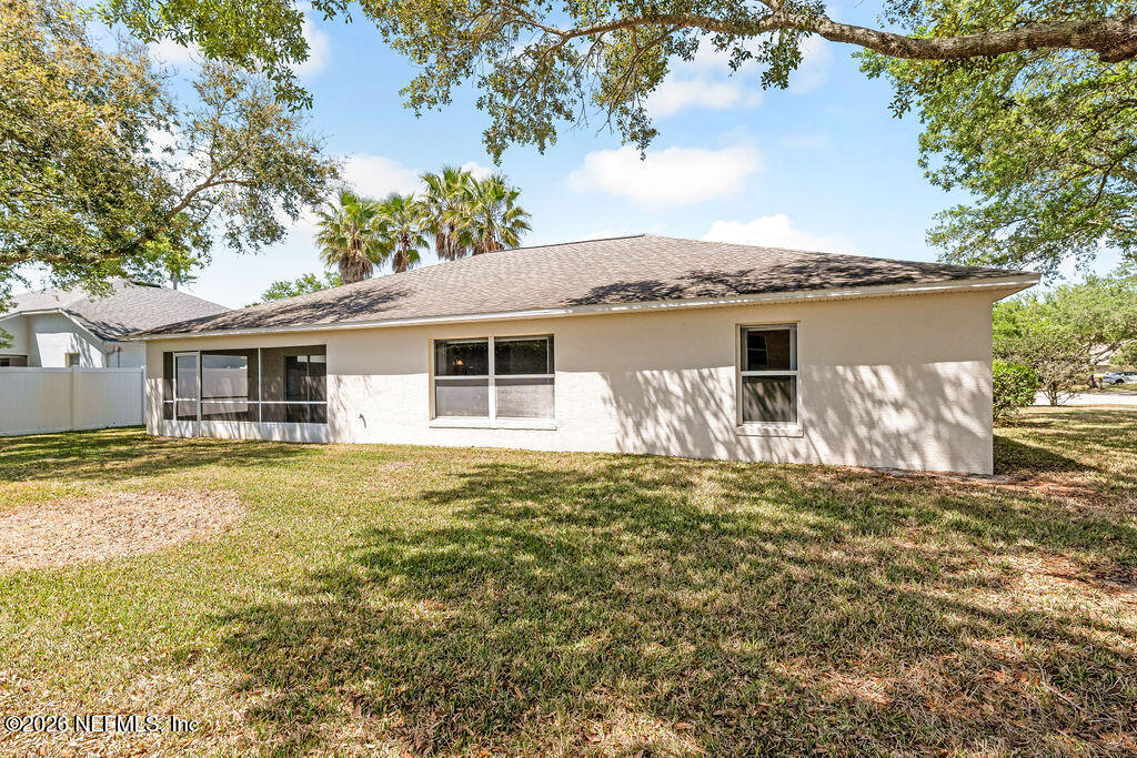 8 Peruvian Lane Ormond Beach, FL 32174 - Photo 28 of 40 a backyard of a house
