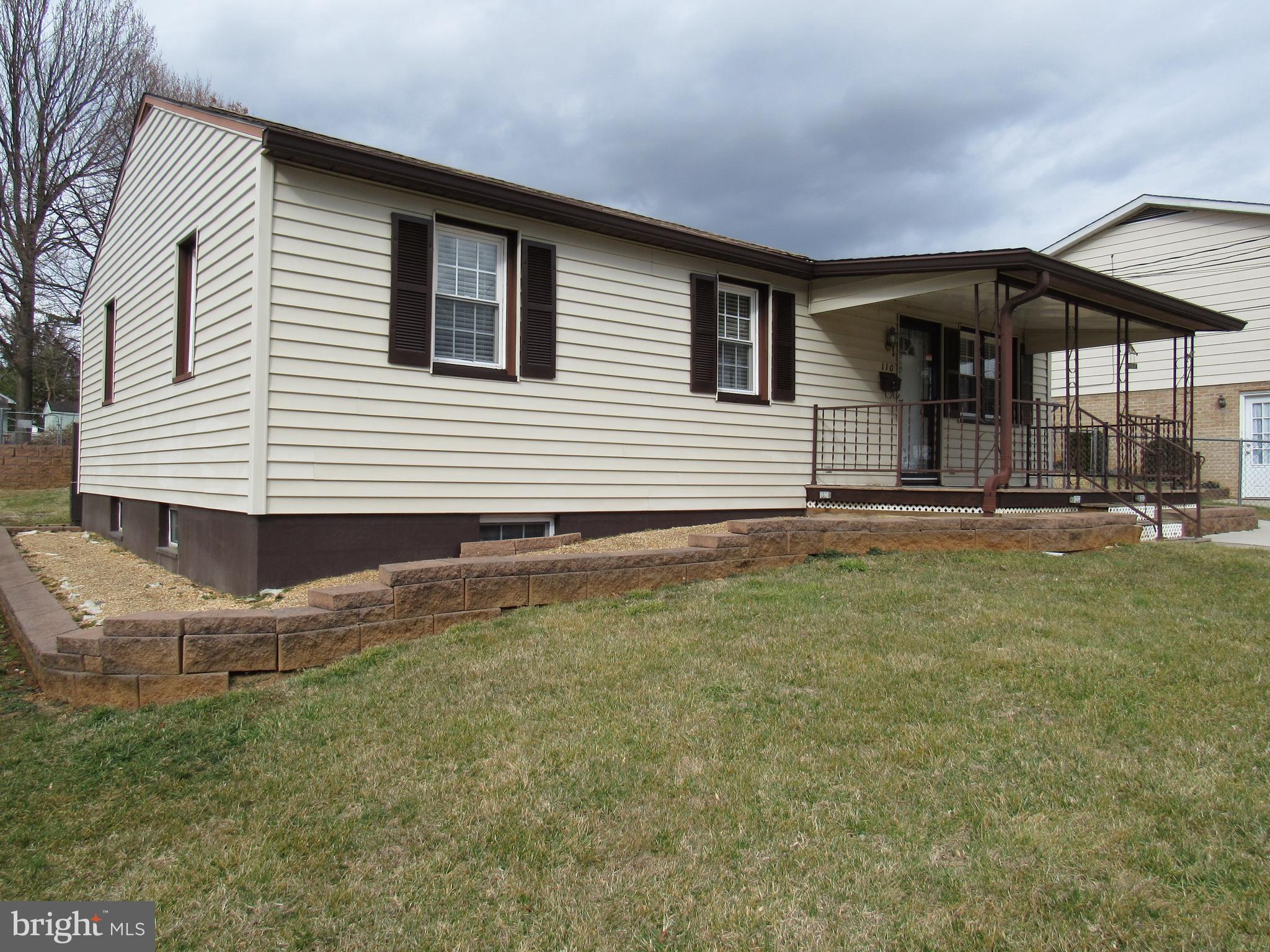 110 West 6th Avenue Ranson, WV 25438 - Photo 2 of 27 a front view of a house with a yard