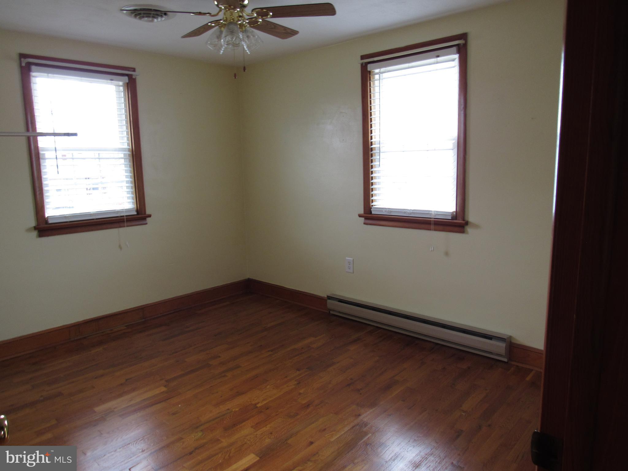 110 West 6th Avenue Ranson, WV 25438 - Photo 16 of 27 an empty room with a window